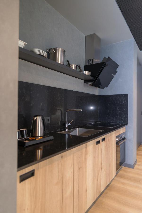 Mk Hotel Tirana Rinas 외부 사진 A kitchen in a serviced apartment in Paris